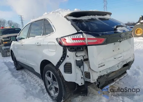 2021 Ford Edge Sel z USA, uszkodzony, nr VIN 2FMPK3J9XMBA11952
